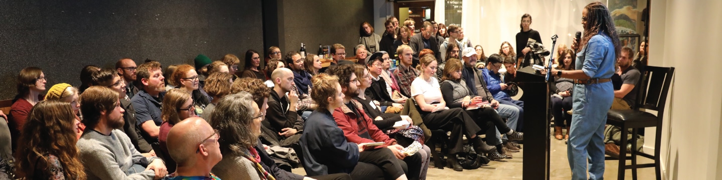 Interior of Literary Arts with crowd